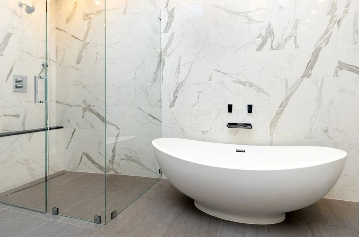 Luxury bathroom remodel with freestanding tub